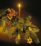 Tannenzweig mit Kerze